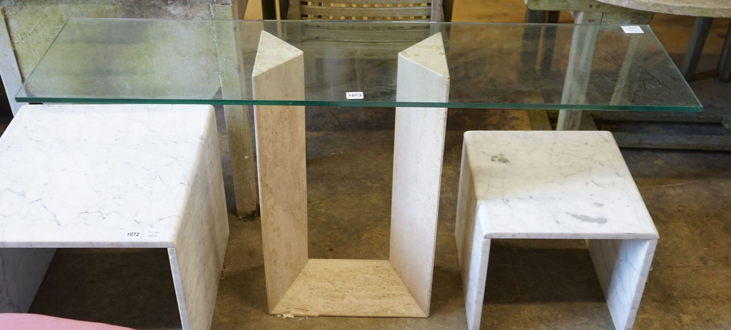 A contemporary rectangular glass topped and reconstituted marble console table, width 130cm, depth 33cm, height 72cm
